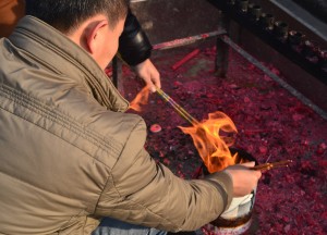 Lighting Incense Sticks, Top Attractions in Xian China (Shaanxi)