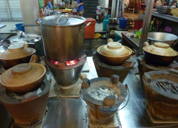 Cooking Claypot Chicken on Jalan Alors