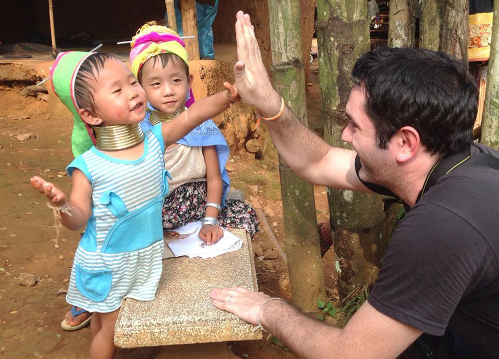 Hi 5 with Young Girl, Chiang Rai Akha Hill Tribes Northern Thailand, Asia