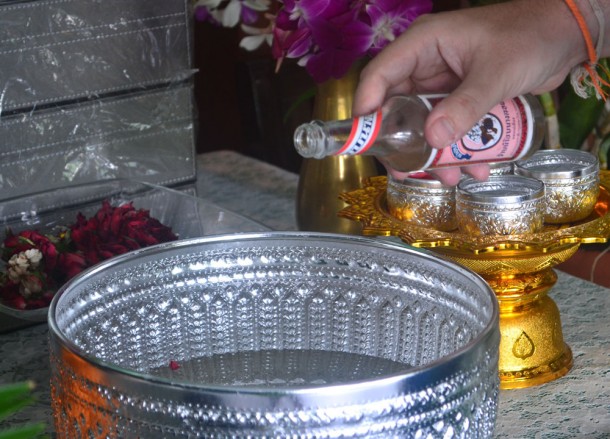Pouring Oil in Scented Water, Songkran Temple Ceremony, Song Nam Pra