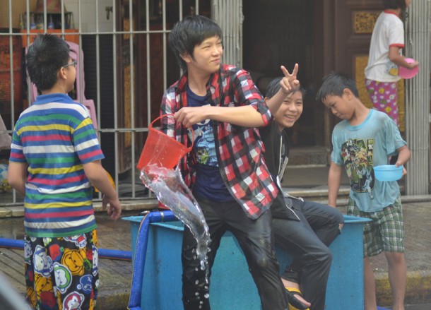 Local Kids on Street, Thingyan Water Festival in Yangon, Myanmar Songkran