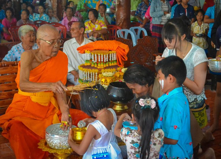 Blessing from Elder Monk at Temple on Songkran Festival in Thailand