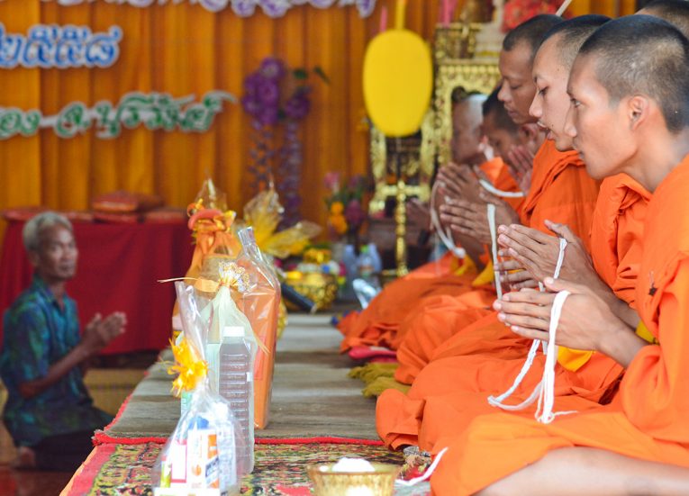 Monks Praying With Sacred Thread during New Year Songkran New Year Festival in Thailand