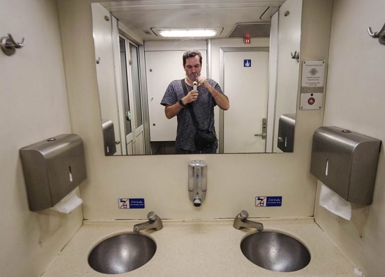 Monkey-Shower-using-sinks-and-water-on-Train-from-Bangkok-to-Singapore-by-Train