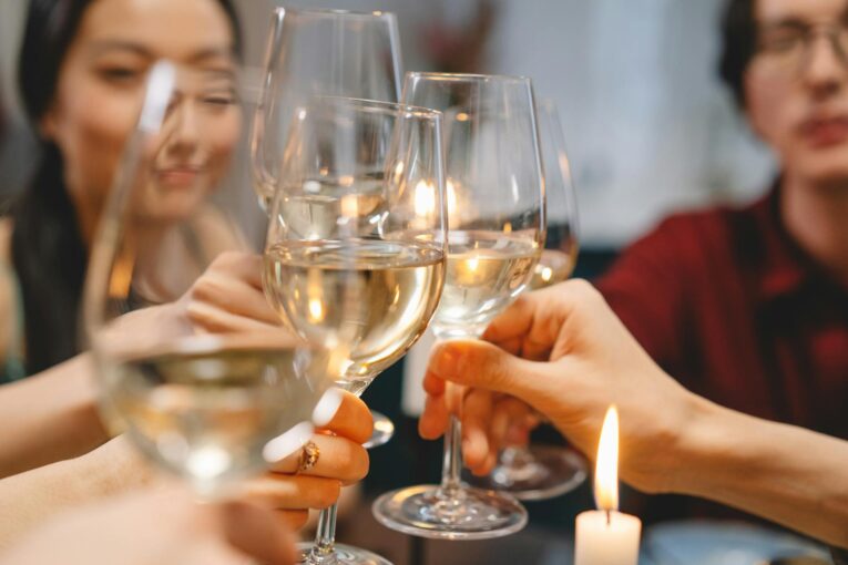 a group toasting their glasses