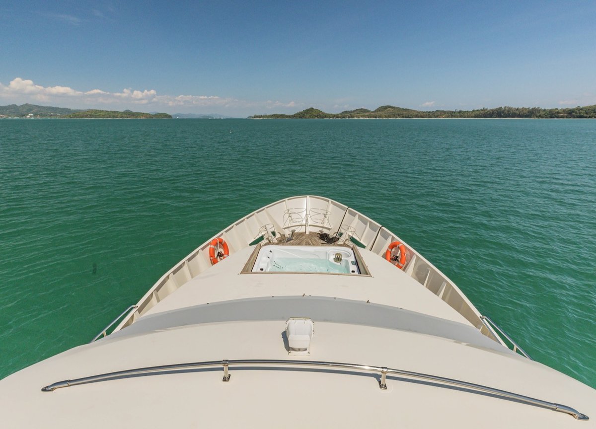 View from the bow of a yacht towards islands near Phuket